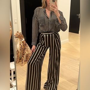 Black and cream striped wide leg satin pants